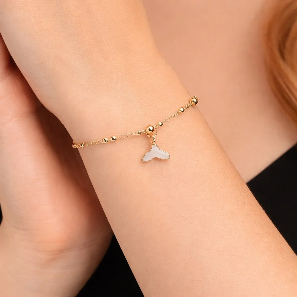 Gold Beaded Bracelet With Whale Tail Charm